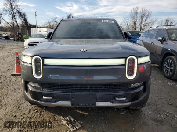 2022 Rivian R1T Adventure Package with VIN 7FCTGAAAXNN005667, listed as a Copart auction lot 44321435 with 48,249 mi miles and Salvage Title. Bid and sale history available at carsss.com. Image 5.