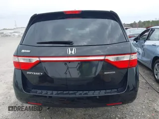 2012 Honda Odyssey Touring with VIN 5FNRL5H96CB058828, listed as a IAAI auction lot 41731389 with 152,295 mi miles and . Bid and sale history available at DreamBid. Image 16.