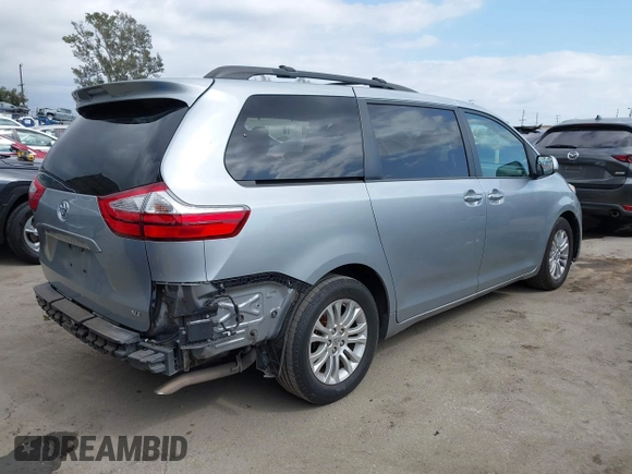 2015 Toyota Sienna XLE with VIN 5TDYK3DC1FS611521, listed as a IAAI auction lot 42136356 with 102,734 mi miles. Bid and sale history available at carsss.com. Image 4.