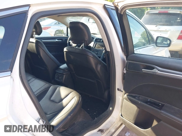 2014 Ford Fusion Titanium with VIN 3FA6P0K95ER128961, listed as a IAAI auction lot 42750668 with 197,188 mi miles and . Bid and sale history available at DreamBid. Image 8.