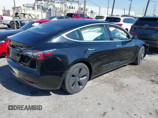 2018 Tesla Model 3 Long Range Battery with VIN 5YJ3E1EB9JF183920, listed as a IAAI auction lot 41657742 with 107,358 mi miles and . Bid and sale history available at DreamBid. Image 4.