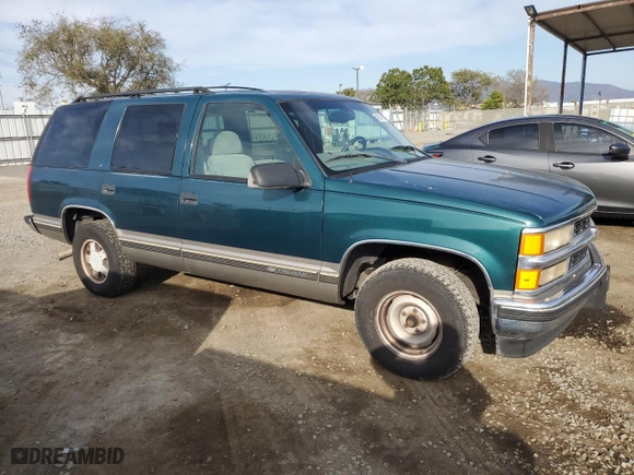 1999 Chevrolet Tahoe with VIN 1GNEC13R4XJ333150, listed as a Copart auction lot 48514915 with 195,543 mi miles and Clean Title. Bid and sale history available at carsss.com. Image 4.