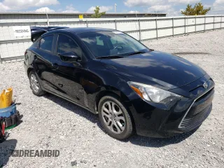2016 Scion iA z VIN 3MYDLBZV8GY129477, wystawiony jako Copart lot #65612833 z przebiegiem 72 741 mil mil oraz . Historia ofert i sprzedaży dostępna na DreamBid. Obrazek 4.