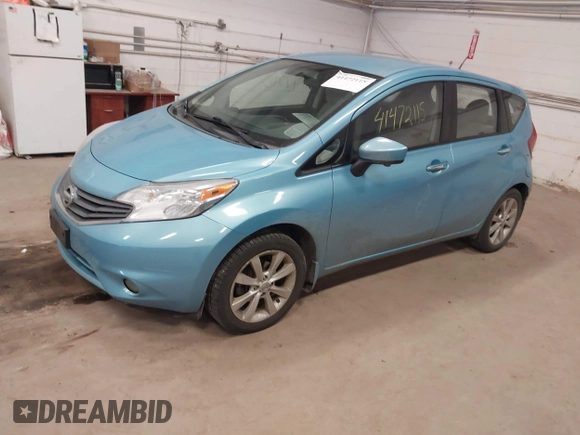 2015 Nissan Note S z VIN 3N1CE2CP2FL442490, wystawiony jako IAAI lot #41472115 z przebiegiem 106 028 mil mil oraz . Historia ofert i sprzedaży dostępna na DreamBid. Obrazek 2.