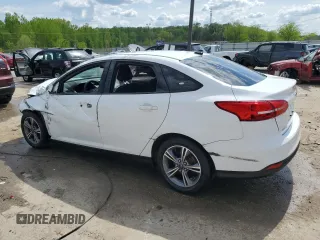 2018 Ford Focus SE with VIN 1FADP3FE0JL286102, listed as a Copart auction lot 54220415 with 142,956 mi miles and Non repairable. Bid and sale history available at DreamBid. Image 2.