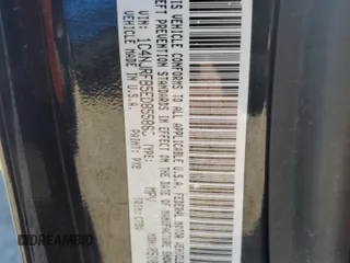 2014 Jeep Patriot Latitude with VIN 1C4NJRFB5ED855888, listed as a Copart auction lot 57969355 with 113,196 mi miles and Salvage title. Bid and sale history available at DreamBid. Image 12.