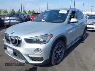 2019 BMW X1 xDrive28i with VIN WBXHT3C56K5L38658, listed as a IAAI auction lot 42496734 with 49,373 mi miles and . Bid and sale history available at DreamBid. Image 17.