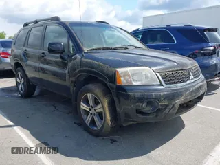 2011 Mitsubishi Endeavor z VIN 4A4JM3AS2BE006598, wystawiony jako IAAI lot #42026882 z przebiegiem 58 655 mil mil oraz . Historia ofert i sprzedaży dostępna na DreamBid. Obrazek 1.