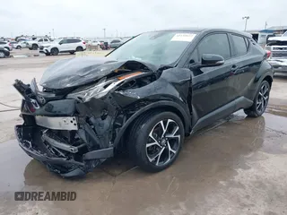 2020 Toyota C-HR LE z VIN JTNKHMBX1L1074377, wystawiony jako IAAI lot #42135672 z przebiegiem 88 846 mil mil oraz . Historia ofert i sprzedaży dostępna na DreamBid. Obrazek 18.