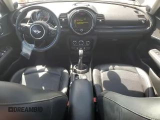 2016 MINI Clubman z VIN WMWLN5C53G2E29697, wystawiony jako Copart lot #52791585 z przebiegiem 115 213 mil mil oraz Tytuł czysty. Historia ofert i sprzedaży dostępna na DreamBid. Obrazek 8.