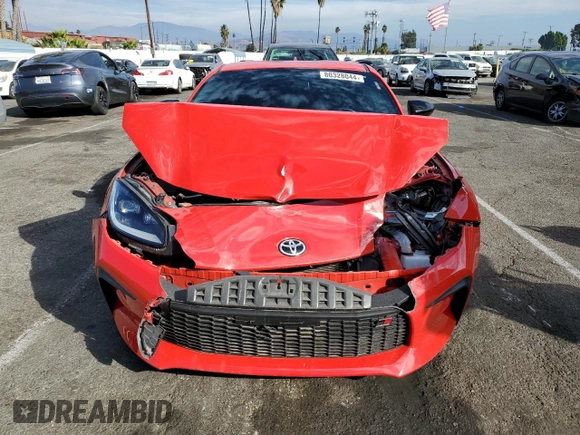 2023 Toyota GR86 with VIN JF1ZNBC11P8759329, listed as a Copart auction lot 80328044 with 10,616 mi miles and Salvage Title. Bid and sale history available at carsss.com. Image 5.