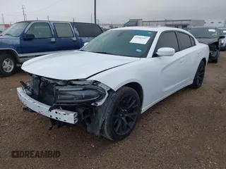 2015 Dodge Charger SXT with VIN 2C3CDXHGXFH789486, listed as a IAAI auction lot 42083357 with 170,372 mi miles and . Bid and sale history available at DreamBid. Image 18.