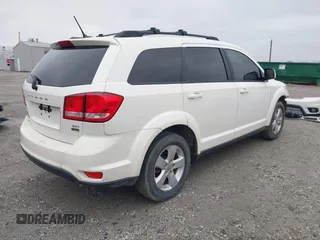 2012 Dodge Journey SXT with VIN 3C4PDCCG6CT132457, listed as a IAAI auction lot 41907657 with 169,160 mi miles and . Bid and sale history available at DreamBid. Image 4.