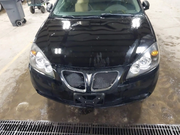 2006 Pontiac G6 6-Cyl z VIN 1G2ZG558764275630, wystawiony jako IAAI lot #41446766 z przebiegiem 218 181 mil mil oraz . Historia ofert i sprzedaży dostępna na DreamBid. Obrazek 6.