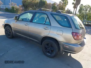 1999 Lexus RX 300 Luxury SUV with VIN JT6HF10UXX0055700, listed as a IAAI auction lot 41330497 with 203,087 mi miles. Bid and sale history available at carsss.com. Image 3.
