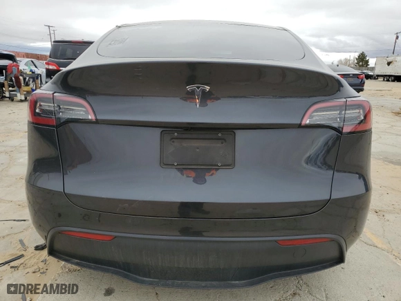 2024 Tesla Model Y with VIN 7SAYGDED8RF039678, listed as a Copart auction lot 45178745 with 32,770 mi miles and Salvage Title. Bid and sale history available at carsss.com. Image 6.