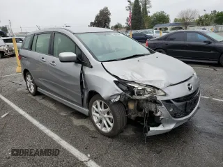 2012 Mazda 5 Touring with VIN JM1CW2CL8C0121599, listed as a Copart auction lot 50520895 with 131,948 mi miles and Salvage title. Bid and sale history available at DreamBid. Image 4.