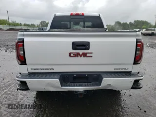 2017 GMC Sierra 1500 Denali z VIN 3GTU2PEJ8HG353759, wystawiony jako Copart lot #56432225 z przebiegiem 107 371 mil mil oraz Czysty tytuł • Clean title. Historia ofert i sprzedaży dostępna na DreamBid. Obrazek 6.