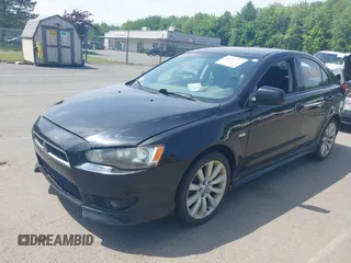 2010 Mitsubishi Lancer GTS z VIN JA32X8HWXAU002021, wystawiony jako IAAI lot #42523978 z przebiegiem 165 635 mil mil oraz . Historia ofert i sprzedaży dostępna na DreamBid. Obrazek 2.