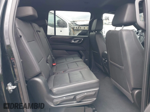2022 Chevrolet Suburban Z71 with VIN 1GNSKDKD7NR345224, listed as a IAAI auction lot 42007246 with 50,300 mi miles and . Bid and sale history available at DreamBid. Image 8.