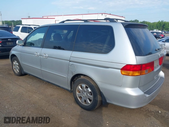 2003 Honda Odyssey EX-L with VIN 5FNRL18913B061340, listed as a IAAI auction lot 42633790 with 1,281,195 mi miles and . Bid and sale history available at DreamBid. Image 3.