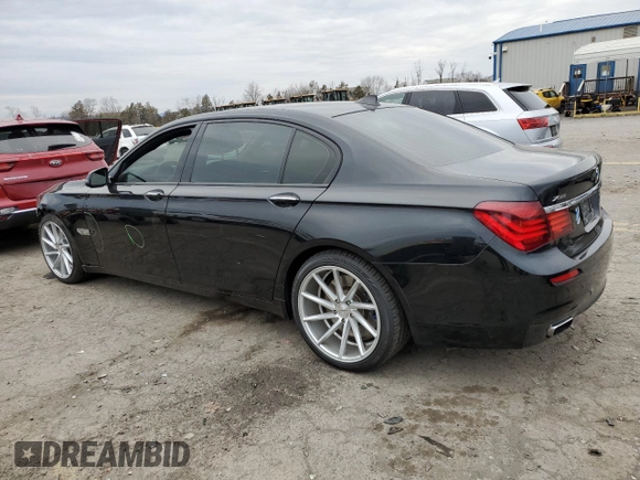 2015 BMW 7 Series 750Li xDrive z VIN WBAYF8C54FD654795, wystawiony jako Copart lot #82381894 z przebiegiem 56 968 mil mil oraz Szkoda całkowita • Salvage title. Historia ofert i sprzedaży dostępna na DreamBid. Obrazek 2.