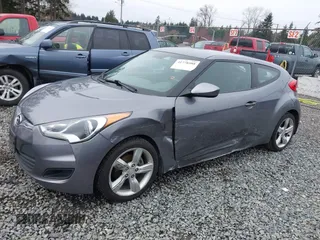 2012 Hyundai Veloster w/Gray Int z VIN KMHTC6AD7CU037130, wystawiony jako IAAI lot #41778588 z przebiegiem 125 549 mil mil oraz . Historia ofert i sprzedaży dostępna na DreamBid. Obrazek 14.