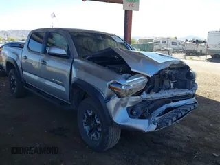2021 Toyota Tacoma 4WD SR with VIN 5TFCZ5AN4MX269187, listed as a IAAI auction lot 41809438 with 81,074 mi miles. Bid and sale history available at carsss.com. Image 1.