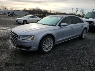 2015 Audi A8 L 3.0T with VIN WAU3GAFD7FN008548, listed as a Copart auction lot 50428525 with 128,457 mi miles and Clean Title. Bid and sale history available at carsss.com. Image 1.