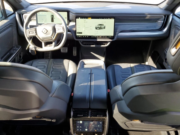 2023 Rivian R1T Adventure with VIN 7FCTGAAA5PN017311, listed as a Copart auction lot 42523755 with 35,039 mi miles and Salvage Title. Bid and sale history available at carsss.com. Image 8.