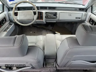 1990 Cadillac DeVille z VIN 1G6CD5337L4238206, wystawiony jako Copart lot #58214584 z przebiegiem Nie podano mil oraz Szkoda całkowita • Salvage title. Historia ofert i sprzedaży dostępna na DreamBid. Obrazek 8.