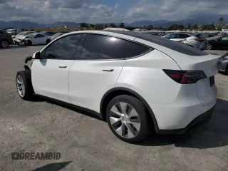 2022 Tesla Model Y Long Range z VIN 7SAYGDEE9NF434908, wystawiony jako Copart lot #56733235 z przebiegiem 38 178 mil mil oraz Szkoda całkowita • Salvage title. Historia ofert i sprzedaży dostępna na DreamBid. Obrazek 2.