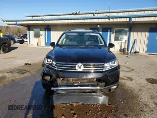 2016 Volkswagen Touareg Sport z VIN WVGEP9BP3GD004865, wystawiony jako Copart lot #87610915 z przebiegiem Nie podano mil oraz Szkoda całkowita • Salvage title. Historia ofert i sprzedaży dostępna na DreamBid. Obrazek 5.