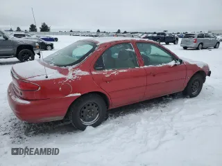 1998 Ford Contour LX with VIN 1FALP6533WK169351, listed as a Copart auction lot 43736955 with 128,150 mi miles and Salvage Title. Bid and sale history available at DreamBid. Image 3.