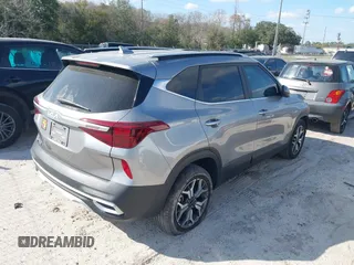 2023 Kia Seltos EX with VIN KNDERCAA7P7356791, listed as a IAAI auction lot 41398783 with 23,695 mi miles. Bid and sale history available at carsss.com. Image 4.