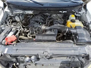 2014 Ford F-150 XL с VIN 1FTMF1CMXEKF21047, выставлен на аукционе Copart как лот 54858515 с пробегом 180 045 миль миль и Чистый • Clean title. История ставок и продаж доступна на DreamBid. Изображение 11.