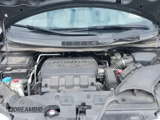 2012 Honda Odyssey Touring with VIN 5FNRL5H93CB121190, listed as a IAAI auction lot 42223998 with 154,358 mi miles and . Bid and sale history available at DreamBid. Image 10.