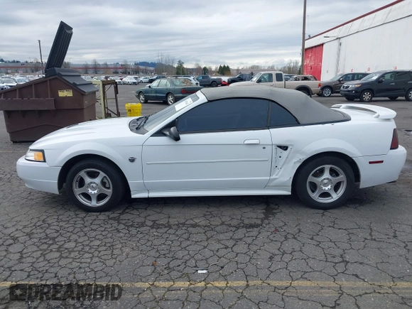 2004 Ford Mustang Deluxe with VIN 1FAFP446X4F134860, listed as a IAAI auction lot 41755643 with 174,410 mi miles. Bid and sale history available at carsss.com. Image 14.