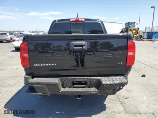 2022 Chevrolet Colorado 2WD LT with VIN 1GCGSCEA5N1288868, listed as a Copart auction lot 64191574 with 57,947 mi miles and Salvage Title. Bid and sale history available at carsss.com. Image 6.