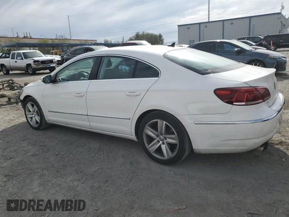2013 Volkswagen CC Sport with VIN WVWBP7AN9DE567212, listed as a Copart auction lot 52998835 with 127,255 mi miles and Salvage Title. Bid and sale history available at carsss.com. Image 2.