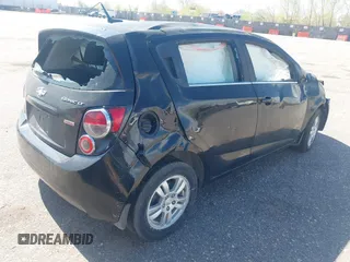 2012 Chevrolet Sonic LT with VIN 1G1JC6SB9C4200197, listed as a IAAI auction lot 42085421 with 124,667 mi miles. Bid and sale history available at carsss.com. Image 4.