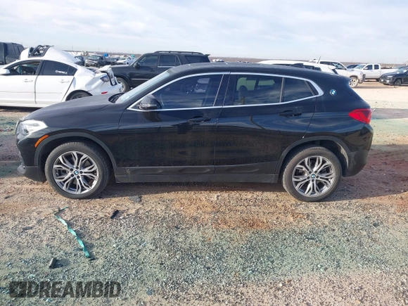 2020 BMW X2 xDrive28i with VIN WBXYJ1C02L5P31038, listed as a IAAI auction lot 41338219 with 72,854 mi miles. Bid and sale history available at carsss.com. Image 14.