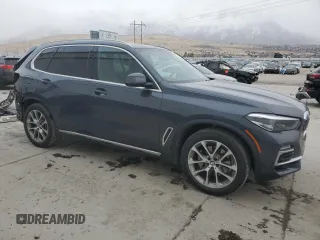 2020 BMW X5 xDrive40i with VIN 5UXCR6C05L9C87208, listed as a Copart auction lot 44582085 with 76,459 mi miles and Salvage Title. Bid and sale history available at carsss.com. Image 4.