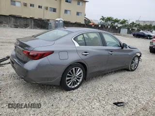 2023 Infiniti Q50 Luxe with VIN JN1EV7BP1PM510616, listed as a Copart auction lot 42381345 with 7,611 mi miles and Non Repairable. Bid and sale history available at DreamBid. Image 3.