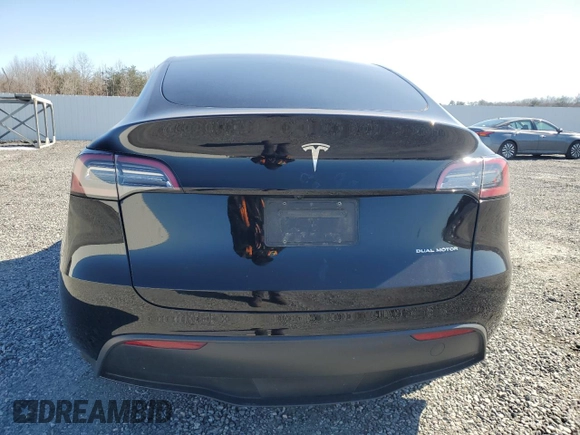 2023 Tesla Model Y Long Range with VIN 7SAYGDEE5PF892285, listed as a Copart auction lot 46458635 with 39,951 mi miles and Salvage Title. Bid and sale history available at DreamBid. Image 6.