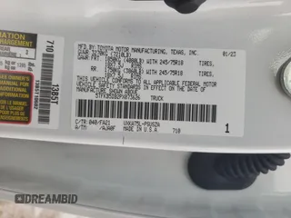 2023 Toyota Tundra SR z VIN 5TFKB5DB2PX073626, wystawiony jako Copart lot #71671243 z przebiegiem 1 188 mil mil oraz . Historia ofert i sprzedaży dostępna na DreamBid. Obrazek 12.