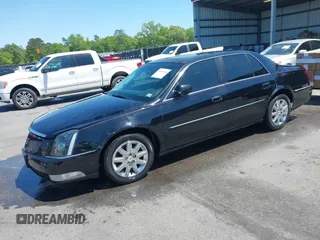 2011 Cadillac DTS Premium Collection z VIN 1G6KH5E65BU140314, wystawiony jako IAAI lot #42050040 z przebiegiem 149 921 mil mil oraz . Historia ofert i sprzedaży dostępna na DreamBid. Obrazek 2.