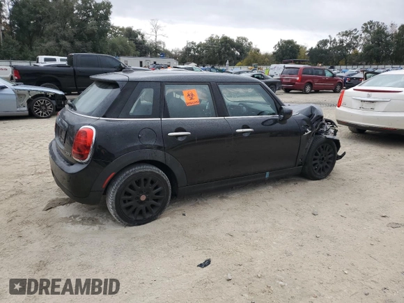 2021 MINI Hardtop 4 Door Oxford Edition with VIN WMWXU7C08M2N64039, listed as a Copart auction lot 83329254 with 31,549 mi miles and Non repairable. Bid and sale history available at DreamBid. Image 3.