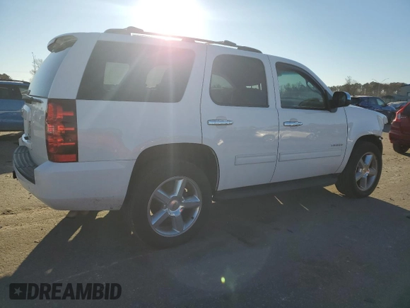 2013 Chevrolet Tahoe LS with VIN 1GNSCAE09DR340125, listed as a Copart auction lot 82894734 with 214,909 mi miles and Salvage title. Bid and sale history available at DreamBid. Image 3.