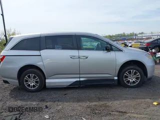 2011 Honda Odyssey EX-L with VIN 5FNRL5H61BB067456, listed as a IAAI auction lot 42131999 with 150,358 mi miles and . Bid and sale history available at carsss.com. Image 13.